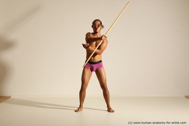 Underwear Fighting with spear Man Asian Athletic Long Black Dynamic poses