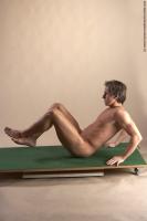 Photo Reference of arnost sitting pose 25