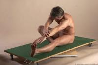 Photo Reference of arnost sitting pose 16