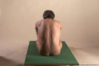 Photo Reference of arnost sitting pose 03
