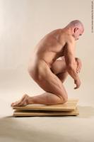 Photo Reference of peter kneeling pose 013