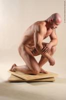 Photo Reference of peter kneeling pose 014