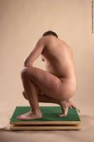 Photo Reference of alfred kneeling pose 017