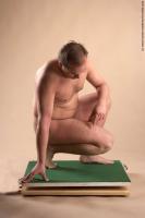 Photo Reference of alfred kneeling pose 021