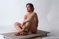 Photo Reference of igor sitting pose 04