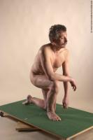 Photo Reference of ales kneeling pose 14
