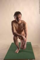 Photo Reference of ales kneeling pose 15