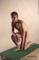 Photo Reference of ales kneeling pose 16