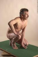 Photo Reference of ales kneeling pose 22