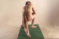 Photo Reference of ales kneeling pose 03