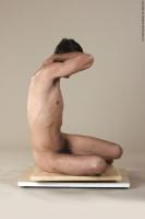 Photo Reference of lubomir sitting pose 23