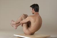 Photo Reference of lubomir sitting pose 38