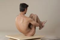 Photo Reference of lubomir sitting pose 40