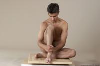 Photo Reference of lubomir sitting pose 43