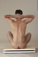 Photo Reference of lubomir sitting pose 05