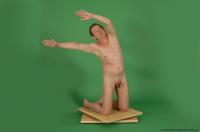 Photo Reference of james kneeling pose 31