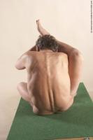 Photo Reference of ales sitting pose 23