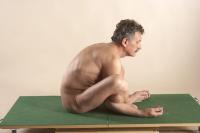 Photo Reference of ales sitting pose 09