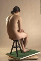 Photo Reference of ernesto sitting pose 12