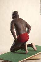 Photo Reference of david kneeling pose 12