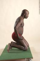 Photo Reference of david kneeling pose 15