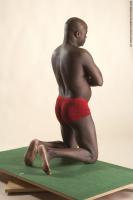 Photo Reference of david kneeling pose 06