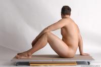 Photo Reference of kamil sitting pose 25