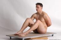 Photo Reference of kamil sitting pose 24