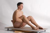 Photo Reference of kamil sitting pose 22