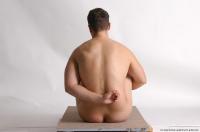 Photo Reference of kamil sitting pose 19