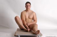 Photo Reference of kamil sitting pose 15