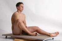 Photo Reference of kamil sitting pose 14