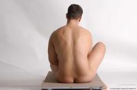 Photo Reference of kamil sitting pose 11