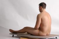 Photo Reference of kamil sitting pose 10