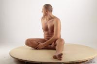 Photo Reference of gregor sitting pose 09