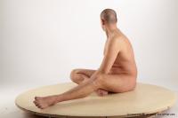 Photo Reference of gregor sitting pose 10