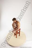 Photo Reference of joshua sitting pose 03a