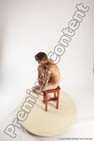 Photo Reference of joshua sitting pose 04a