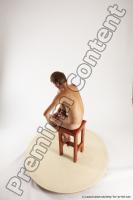 Photo Reference of joshua sitting pose 06a