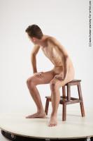 Photo Reference of henrich sitting pose 18