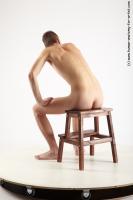 Photo Reference of henrich sitting pose 20