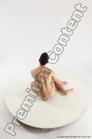 Photo Reference of roland sitting pose 05a