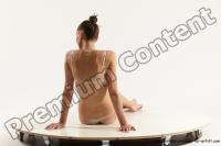 Photo Reference of evelina sitting pose 06b