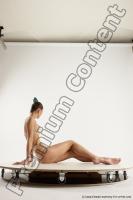 Photo Reference of evelina sitting pose 09c