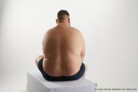 Photo Reference of sitting reference pose ronaldo