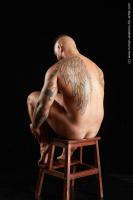 Photo Reference of sitting reference pose grigory