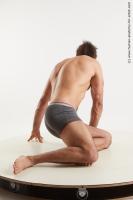 Photo Reference of kneeling reference pose simeon