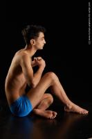 Photo Reference of sitting reference pose danior