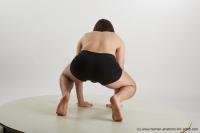 Photo Reference of kneeling reference pose chadwick