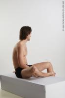 Photo Reference of sitting reference pose chadwick